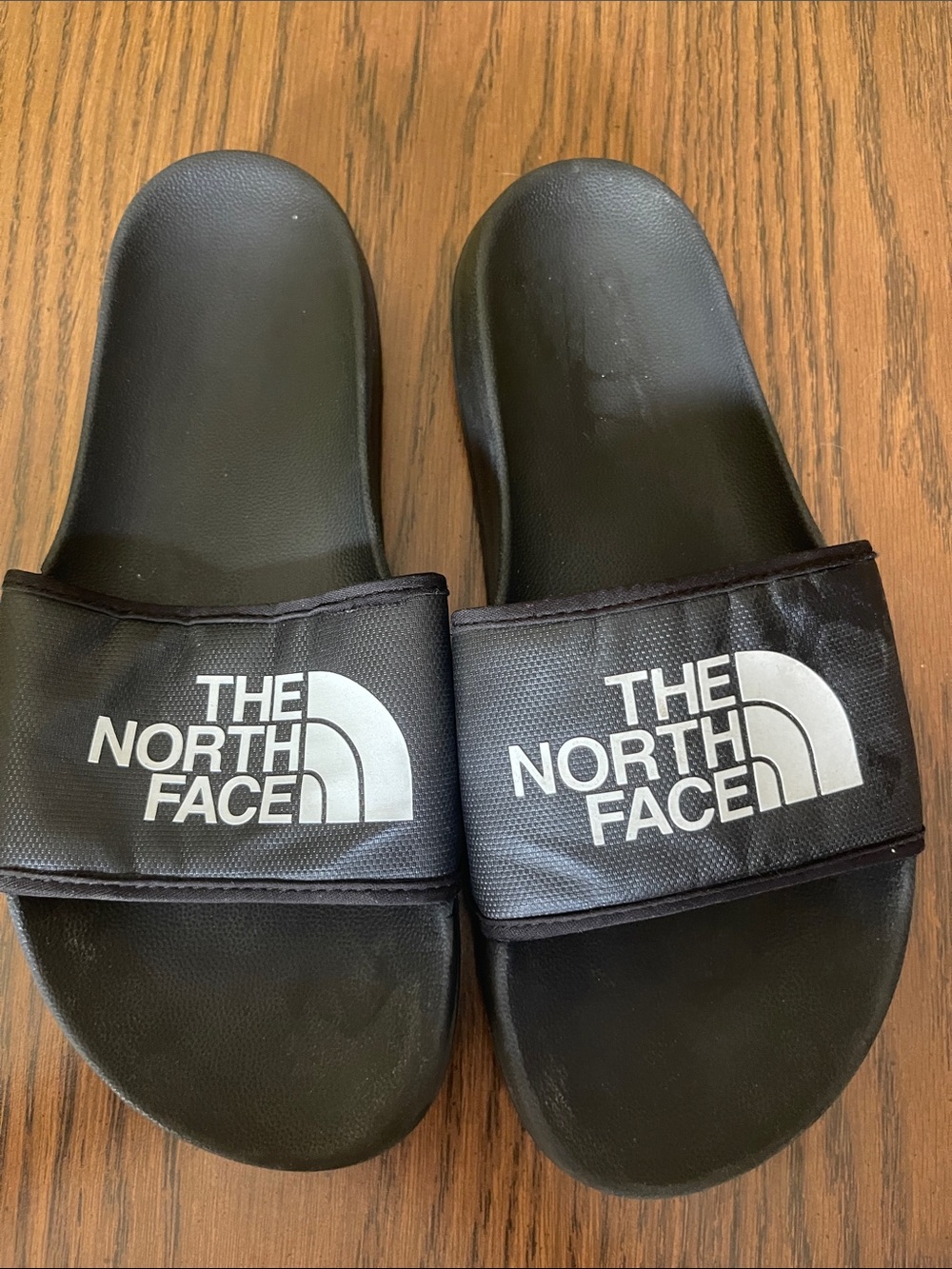 The North Face Woman’s sz 10 Black Slides with White Logo